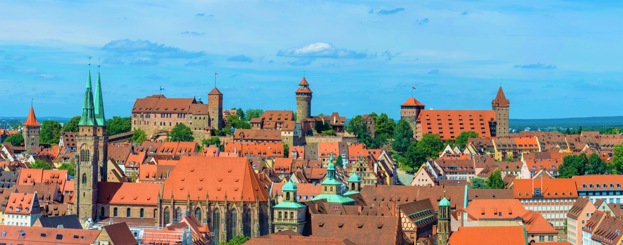 Panorama of the famous castle of Nuremberg and Sebaldus church on a sunny day
